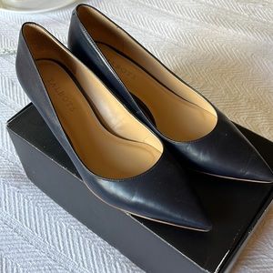 Talbots navy leather pumps with 2” heel.